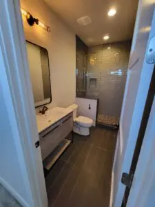 A bathroom with toilet and sink